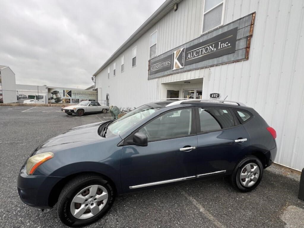 2014 Nissan Rogue W/ 66,000 Miles.