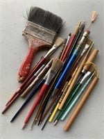 Assorted paintbrushes, calligraphy pens, more