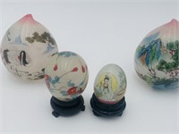 Berautiful glass egg painted with a scene of Story