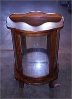 Small oak curved glass lighted curio cabinet with