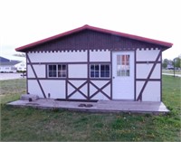 Portable office building with flip down deck,