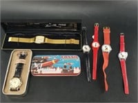Lot of watches including Mickey Mouse etc.