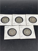 Five silver Washington quarters