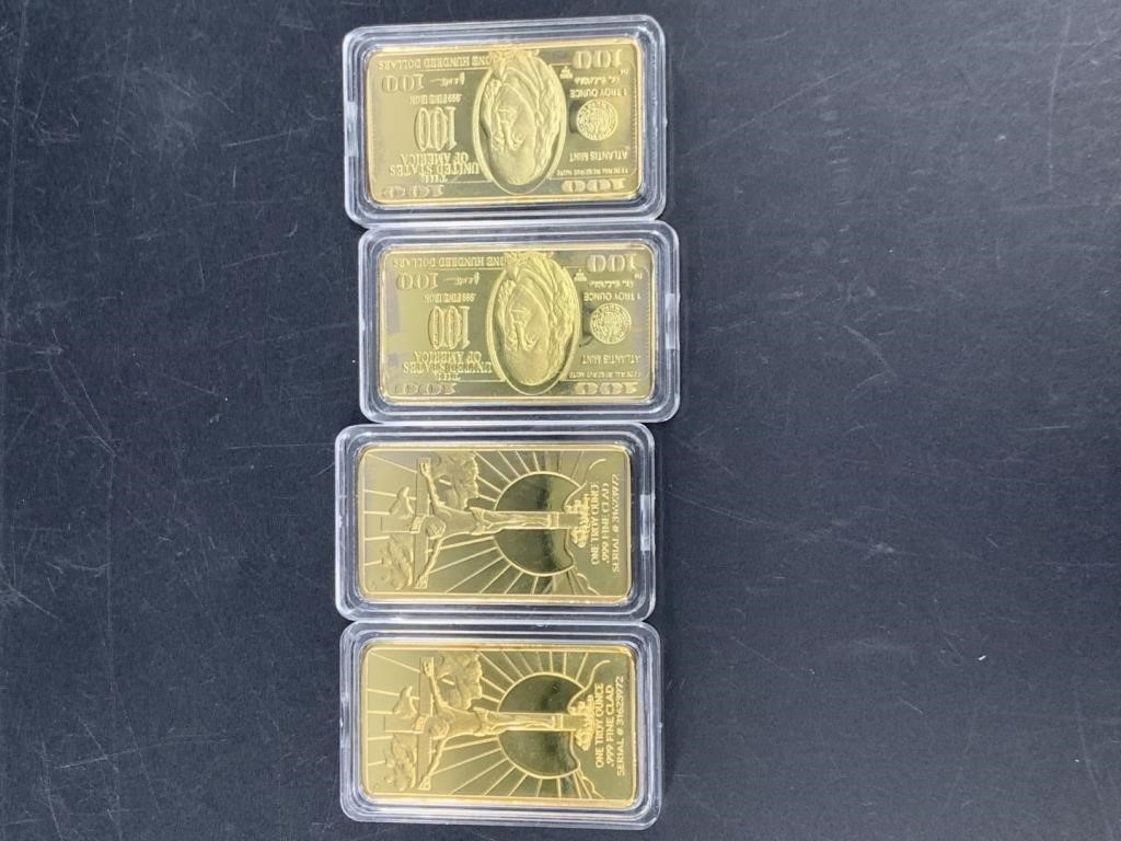 Four gold plated bars