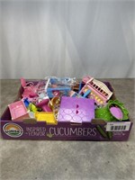Assortment of toy doll furniture and accessories