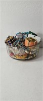 Costume jewelry in large glass bowl