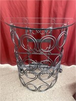 Steel and glass wine rack. Holds 24 bottles.