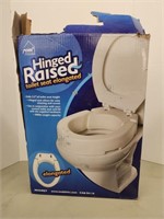 Like New - Hinged Raised Toilet Seat - Elongated,