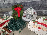 Christmas lights, sign, garland, place mats