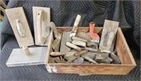 Crate of trowels