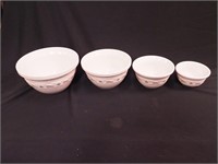 Four-piece Longaberger nesting mixing bowls,