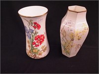 Two Wedgwood china vases averaging 9", both