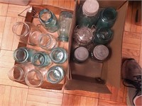 Two boxes of vintage canning jars, mostly blue,