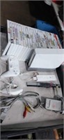 Lot with Nintendo wii and 26 games