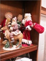 Four Old World Santa figurines from 15" to 20"