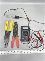 Ohm meter, test light and wire strips