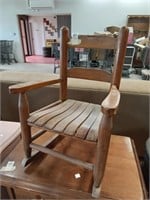 >Solid wood child's rocking chair