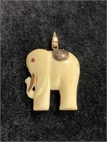 14kt Gold Accented Carved Elephant Pendant
