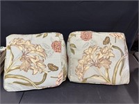 Two book pillows in sage green with floral
