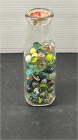 1 pint milk Bottle with marbles.  Important note: