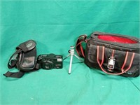 Yashica EZ zoom 70. With carrying pouch and bag.