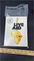 Live Aid 1985 DVDs and Booklet.