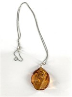 Amber pendant on a sterling silver bale and chain