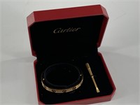 Faux Cartier bracelet with working screw lock, mad