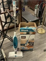 Shark steam & spray cleaner in box.