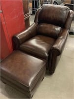 Leather chair with ottoman.