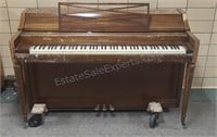 Acrosonic piano built by Baldwin. Includes piano