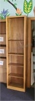 Wood bookshelf. 85½×23½×11½. Attached to wall.