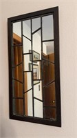 Framed wall mirror with lead dividers, measures
