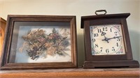 Table clock and a wood shadowbox filled with