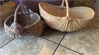 Two larger size handmade buttocks baskets the