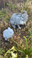 Two plastic yard rabbit bunnies