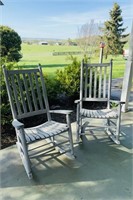 2 oversized wood porch rocking chairs, on the