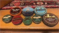8 antique round tobacco tins, four large size and