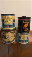 Four antique round tobacco tins, one very old