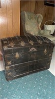 Nice antique Camelback steamer trunk, original