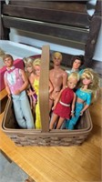 Collection of seven Barbie dolls, Ken, dolls, and