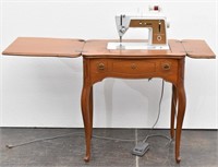 Singer Auto Reel Sewing Machine w/ Cabinet Queen