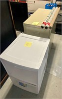 filing cabinet and plastic storage container