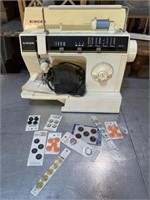 Singer sewing machine w/ buttons
