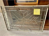 leaded glass window with crack