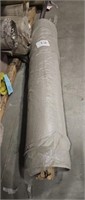 Large roll of rubber underlayment