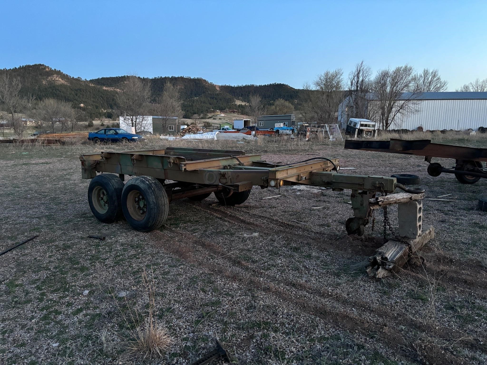 Military trailer for logs, telephone poles, etc