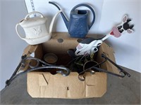 Box lot of plant hangers, watering cans, misc