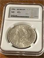 1884 MORGAN SILVER DOLLAR - GRADED MS 67