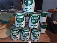 Six cans Quaker State SAE 10w30 motor oil, one